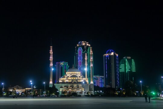 Russia, Chechnya, the Chechen Republic, the city of Grozny. Night view of the mosque the heart of Chechnya against the backdrop of skyscrapers Grozny city