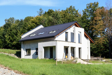 KRAKOW, POLAND - SEPTEMBER 12, 2021: Construction site of a detached house in Krakow, Poland