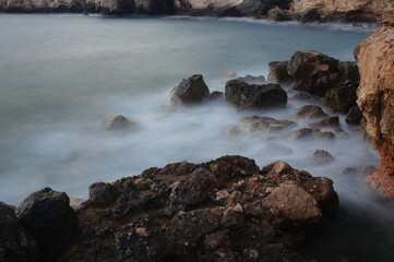 waves crashing on rocks