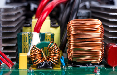 Close-up of copper coil on the power supply circuit board.