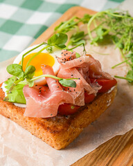 Smorrebrod, traditional Danish open sanwiches, dark rye bread with different toppings.