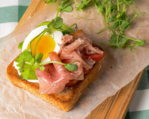 Smorrebrod, traditional Danish open sanwiches, dark rye bread with different toppings.