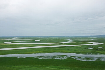 view of a field and river