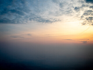Obraz premium Sunrise view to sky and clouds from high altitude