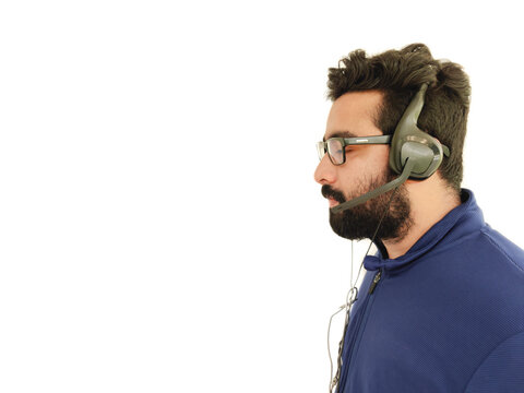 Beard indin Man listening music over white background,Space for text.Selective focus.