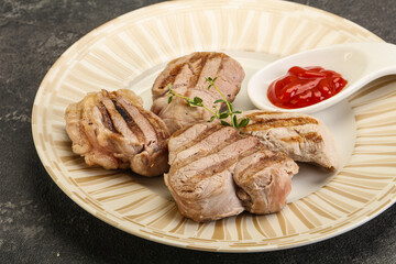 Grilled pork tenderlion with tomato sauce