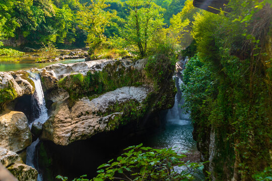 MARTVILI, GEORGIA: Landscape with a view of a beautiful waterfall in the Martvili Canyon on a summer day.