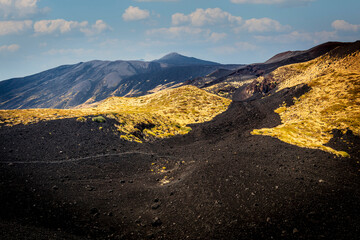 lava road on mount etna in sicily.