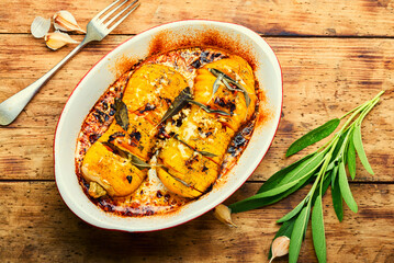 Baked pumpkin with spice herbs,flat lay