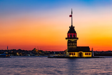 Fototapeta premium Sunset over Bosphorus with famous Maiden's Tower. Istanbul, Turkey