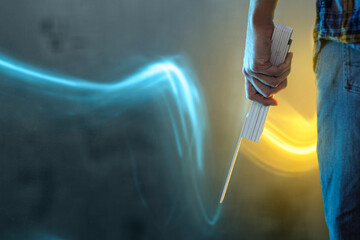 Hand holding a folding rule