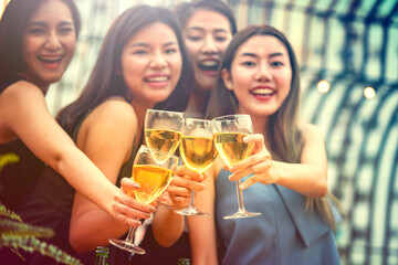 Party time start. Happy people toasting with champagne flutes. Multiethnic friends congratulating each other with new year. Celebration holiday concept, holiday background. selective focus