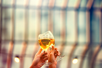 Party time start. Happy people toasting with champagne flutes. Multiethnic friends congratulating each other with new year. Celebration holiday concept, holiday background. selective focus