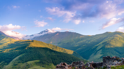 Mountains of North Ossetia, beautiful summer landscapes with blue sky and clouds.