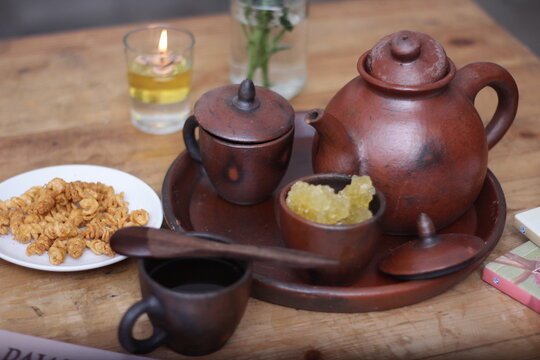 still life tea pot with sugar cube. Teh poci gula batu. Indonesian tea style.
