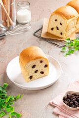 Indonesian Raisin bread plate on tray. Raisin bread is a type of bread made with raisins and flavored with cinnamon. It is usually a white flour or egg dough bread.