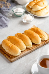 indonesian Bread with grated coconut filling plating on plate