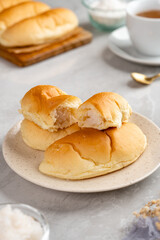 indonesian Bread with grated coconut filling plating on plate