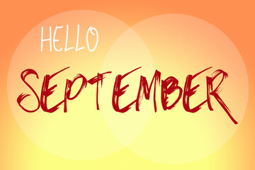 Hello September word on orange yellow background.