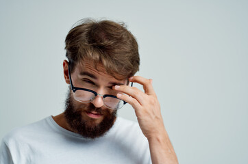 bearded man with poor eyesight health problems close-up