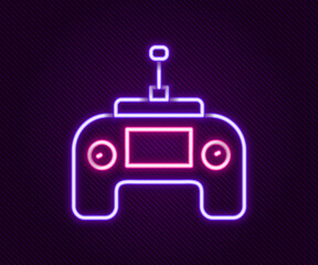 Glowing neon line Drone radio remote control transmitter icon isolated on black background. Colorful outline concept. Vector