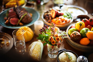 Fototapeta na wymiar Table full of Thanksgiving food
