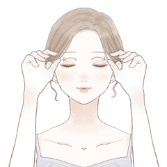 目の上をマッサージする女性