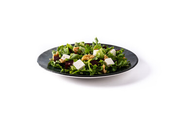 Beetroot salad with feta cheese,lettuce and walnuts isolated on white background