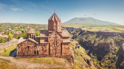 Aerial view of Hovhannavank monastery and church on the edge of a scenic Kasakh gorge and canyon. Travel and religious destinations and attractions in Armenia