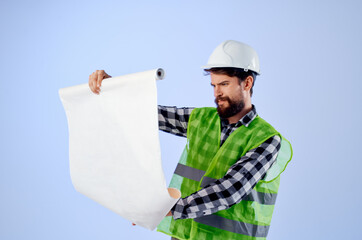 male builder with documents and drawings blueprints isolated background