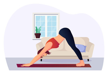Woman in Downward Dog position practicing Yoga for wellness
