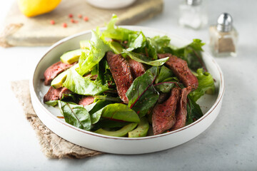 Beef steak salad with avocado