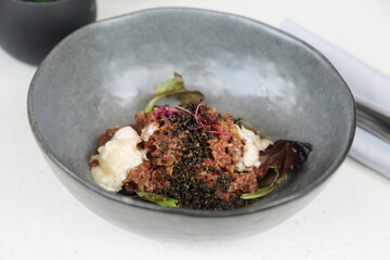 Steak tartare with truffle and parmesan cheese