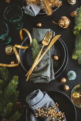 Christmas table setting in dark - obrazy, fototapety, plakaty