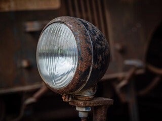 Fototapeta na wymiar old and vintage headlight of tractor