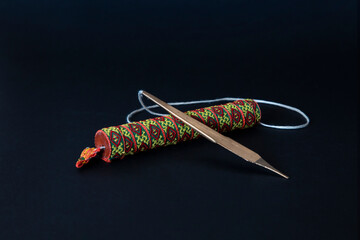 Dan Moi, Vietnamese jaw harp with case on black background