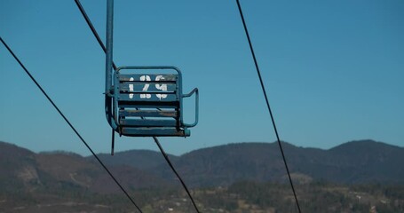 Old non-working chair lift in mountains. Cinema 4K 60fps video