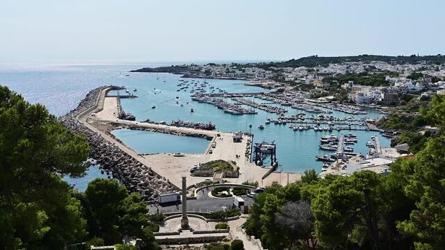Santa maria di Leuca, Puglia, Italy. Amazing footage from the viewpoint of the village, highlighting the port. Tilt movement .Beautiful summer day.