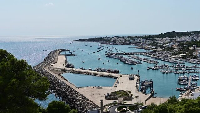 Santa maria di Leuca, Puglia, Italy. Amazing footage from the viewpoint of the village, highlighting the port. Pan movement .Beautiful summer day.