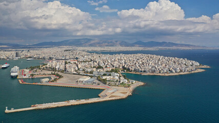 Aerial drone photo of famous busy port of Piraeus where passenger ferries travel to popular Aegean...