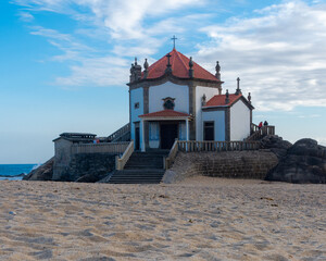 Beautiful church on top of rock on the beach