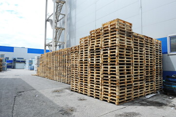 Almaty, Kazakhstan - 07.06.2016 : A stack of wooden pallets at a beer factory