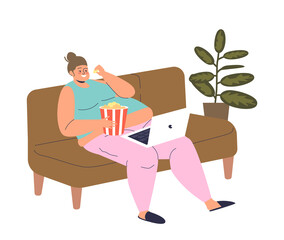 Lazy woman eating popcorn watch show on laptop computer sitting relaxed at home on couch