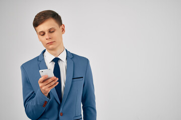 business man in a suit talking on the phone office official