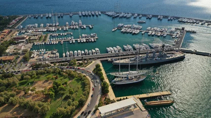 Fotobehang Aerial drone photo of famous seaside Athens riviera area of Faliro and Flisvos featuring a luxury marina for yachts and sailboats, Attica, Greece © aerial-drone
