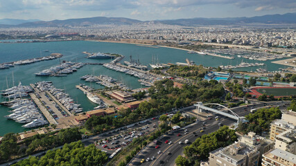 Fototapeta premium Aerial drone photo of famous seaside Athens riviera area of Faliro and Flisvos featuring a luxury marina for yachts and sailboats, Attica, Greece