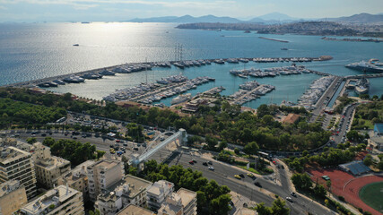 Obraz premium Aerial drone photo of famous seaside Athens riviera area of Faliro and Flisvos featuring a luxury marina for yachts and sailboats, Attica, Greece