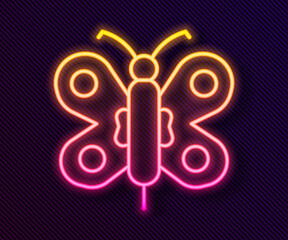 Glowing neon line Butterfly icon isolated on black background. Vector