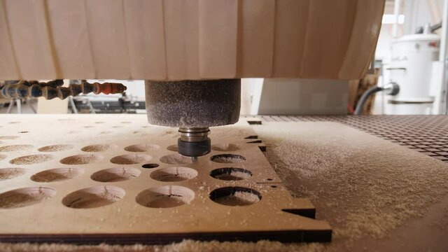 Digital cnc milling machine finish processing laser cut plywood board - manufacturing cutter die mold in modern workshop, camera orbit
