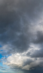 Fantastic thunderclouds, vertical panorama